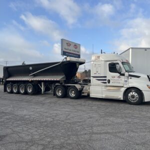 2026 MAC Steel Quad Axle Half Round Dump Trailer for heavy-duty hauling