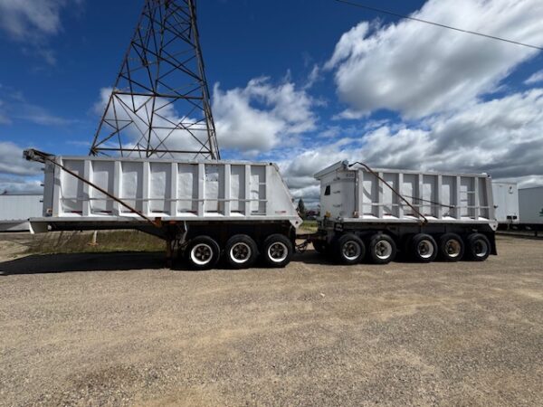 Used 1990 Fruehauf Triple 10 Aluminum Dump Trailers, units 033603 and 033503, at Royal Truck & Utility Trailer